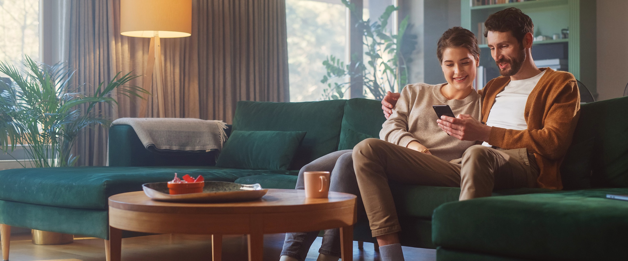 Photo of couple on the couch.