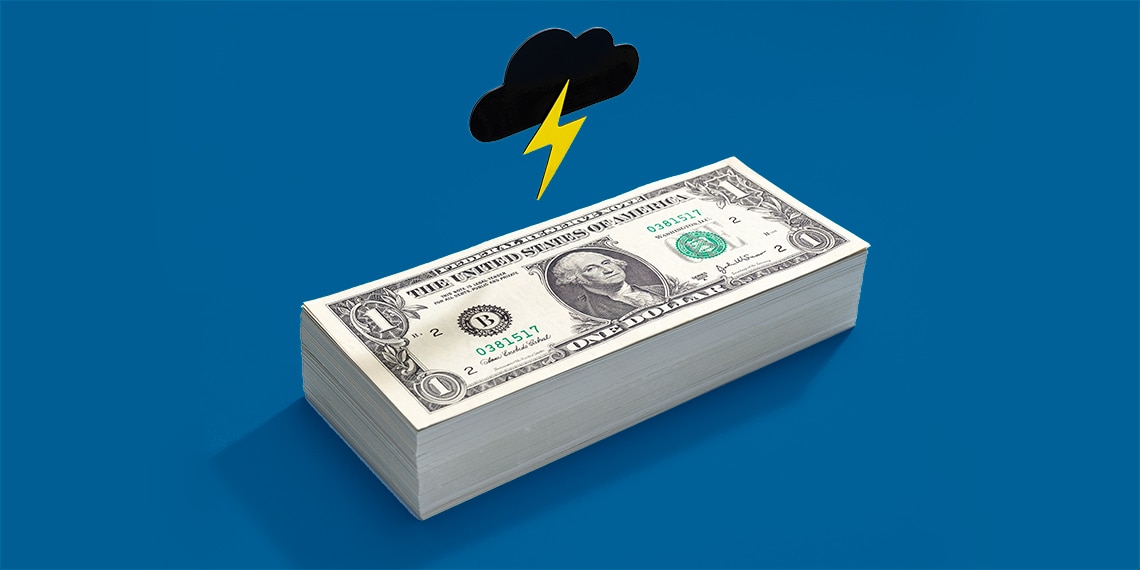 A dark cloud and lightning bolt illustrated above a stack of money.