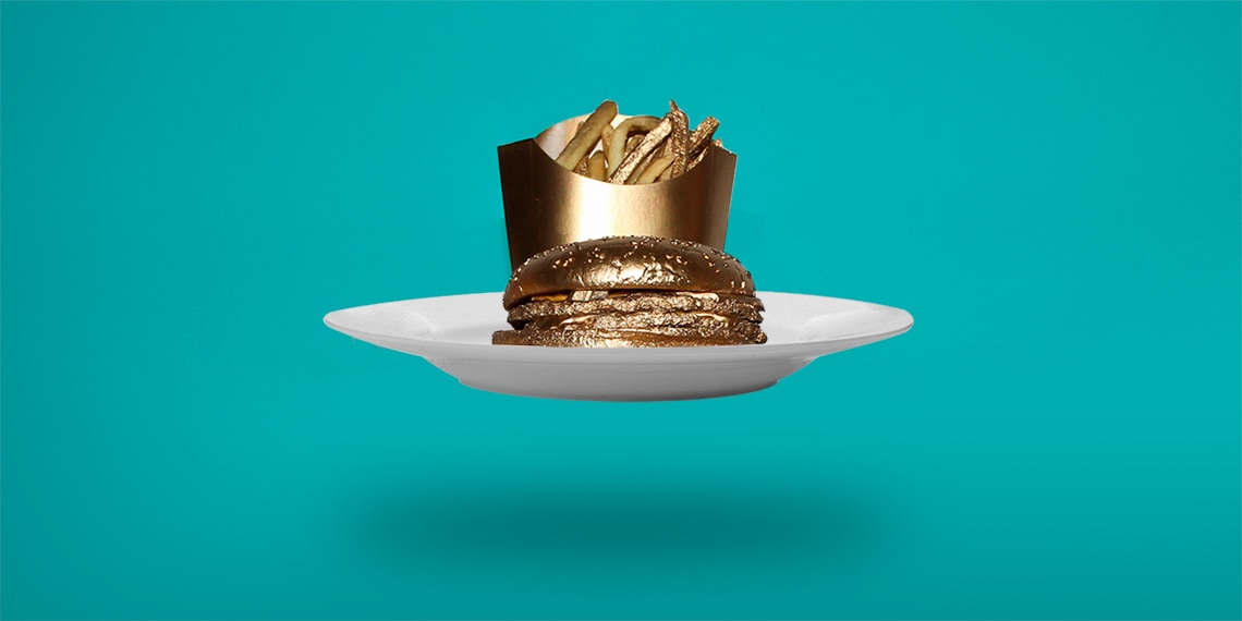 A gilded burger and fries