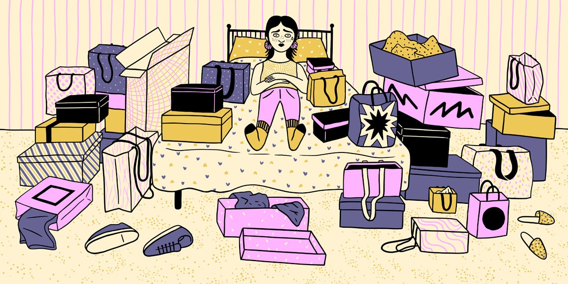 Woman on her bed surrounded by an overwhelming amount of packages.